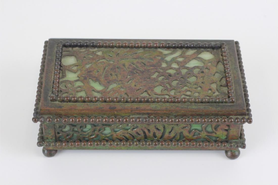 Tiffany Studios Glass & Bronze Stamp Box: Tiffany Studios Glass & Bronze Stamp Box. Glass is cracked. L-4" x W-2.5"