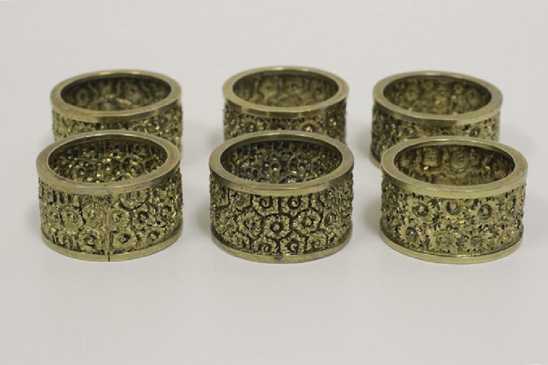 6 Sterling Silver Gold Gilded Napkin Rings: 6 Sterling Silver Gold Gilded Napkin Rings, w/ original dust bags. Dimensions- Dia- 1.5" x H- .75"