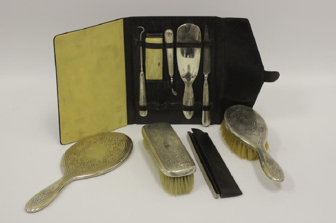 8pcs of Tiffany & Co. Makers Sterling Silver: 8pcs of Tiffany & Co. Makers Sterling Silver, Includes Vanity Set w/ 1 shoe horn, 2 brushes, 1 mirror & 1 comb holder, and 3 other odd pieces.