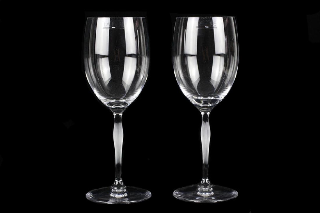 Pair of Lalique Wine Glasses by James Suckling: Pair of Lalique Wine Glasses by James Suckling in Original Box. (New) Dimensions- H-8.75".
