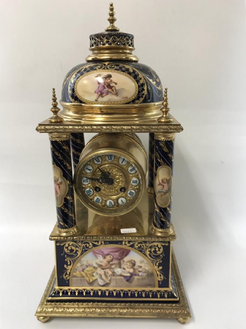 Royal Vienna Hand Painted Porcelain Table Clock: Royal Vienna Hand Painted Porcelain Large Table Clock. All Paintings Signed. Dimensions- H-18.5" x L-9.5" x W-9.5".