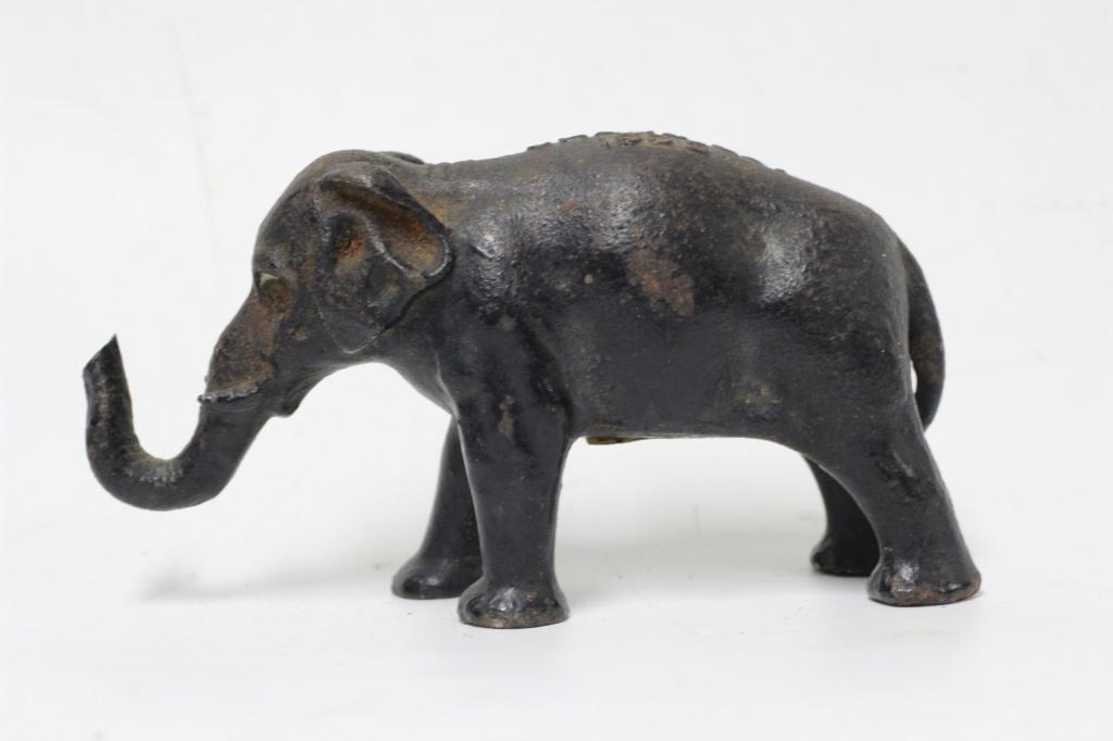 Cast Iron Figural Elephant: Cast Iron Figural Elephant Advertising "1855 Crane Co. 1905". Dimensions: L-4" x H-2".