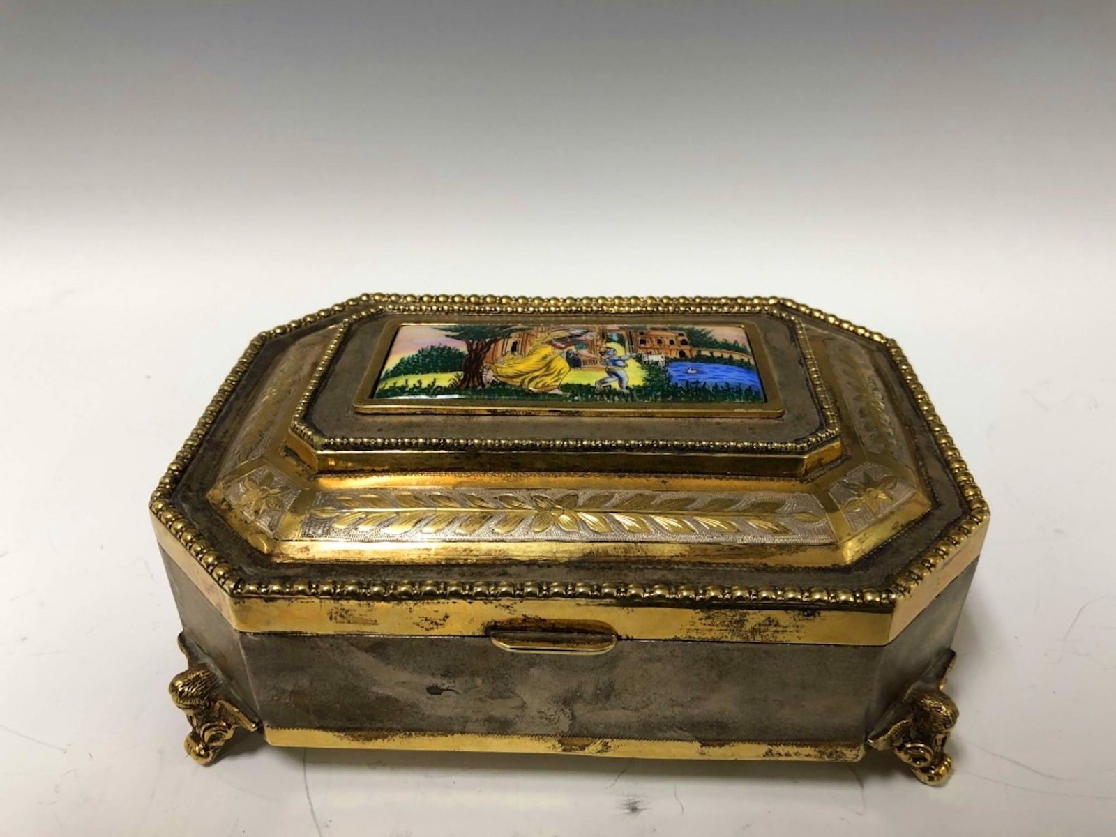 Sterling Silver Gilded Box w/ Enameled Medallion: Sterling Silver Gilded Large Box w/ Enameled Medallion. Provenance from a Private Collector in Westchester, NY. Good Condition. Dimensions- L-7" x W-5" x H-3". Total Weight- 895g/28.77ozt.