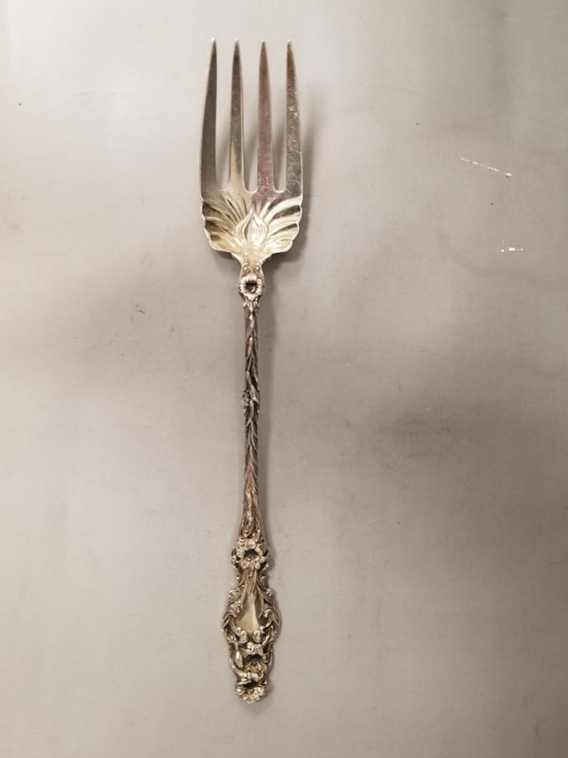 Sterling Silver Serving Fork. Lilly Pattern: Sterling Silver Serving Fork. Lilly Pattern, Whiting, MA. Fully Hallmarked. Good Condition. Provenance From a Long Island, NY Collection. Total Weight- 134.3g/4.3ozt. Dimensions- L-11.5".