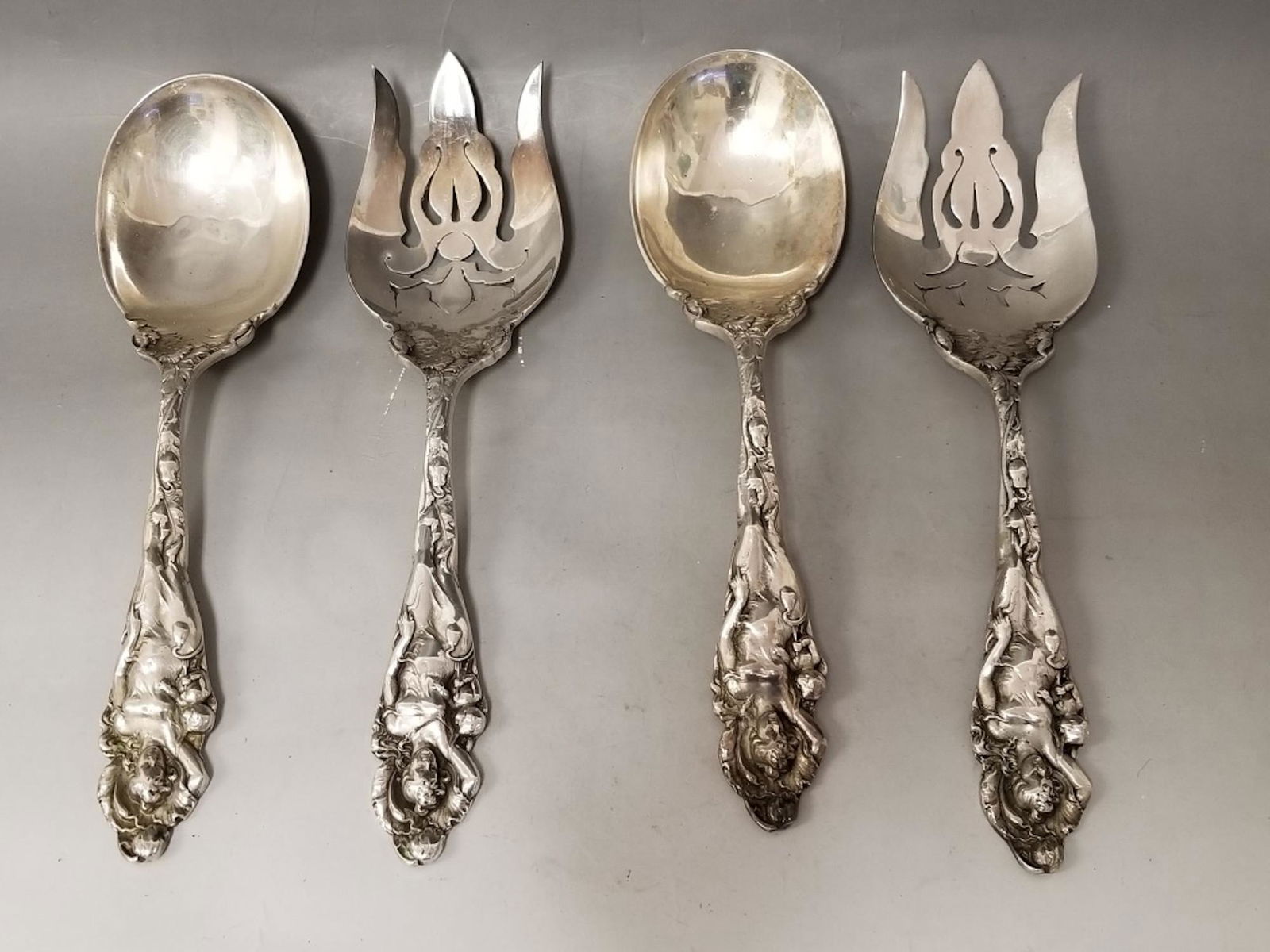 4 Sterling Silver Large Serving Utensils: 4 Sterling Silver Large Serving Utensils Including 2 Large Spoons & 2 Large Salad Forks. Provenance from a Long Island, NY Estate. Good Condition. Dimensions- Each- L-11". Total Weight- 824.3g/26.5ozt