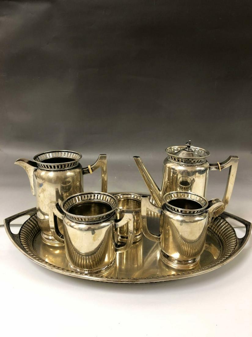 6pc 800 Silver Austrian Tea & Coffee Set: 6pc 800 Silver Austrian Tea & Coffee Set. Serving Pieces All Hallmarked w/ Face of a Man & Initials A.B. The Tray is Associated, Hallmarked 800. Provenance from a Queens NY Estate. Generally Good Cond