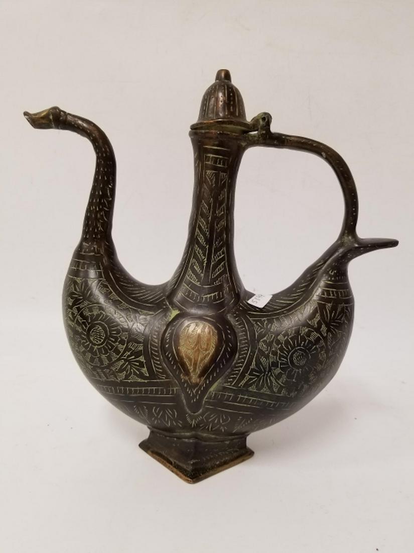 Islamic Vintage Heavy Bronze Wine Pitcher: Islamic Vintage Heavy Bronze Wine Pitcher w/ Islamic Calligraphy. Provenance from a Long Island, New York Home. Good Condition. Dimensions- W-11" x H-11.5".