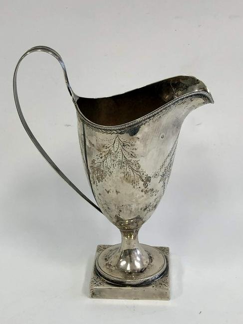 Coin Silver Colonial Milk Pitcher: Coin Silver Colonial Milk Pitcher by John Gibbs, Providence RI. Circa 1790. Fully Hallmarked. Monogrammed. Provenance from a Long Island NY Collection. Generally Good Condition. Dimensions- H-6.75" x