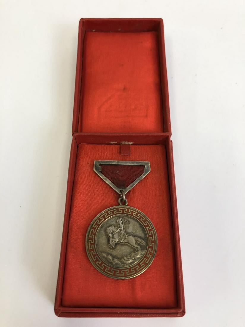 Russia WWII Soldier on Horse Silver Order: Russia WWII Soldier on Horse Silver Order w/ Red Ribbon. Medal No. 386. In Original Box. Soviet Combat Medal. Good Condition. Provenance From a New York Estate. Please note the absence of a condition 