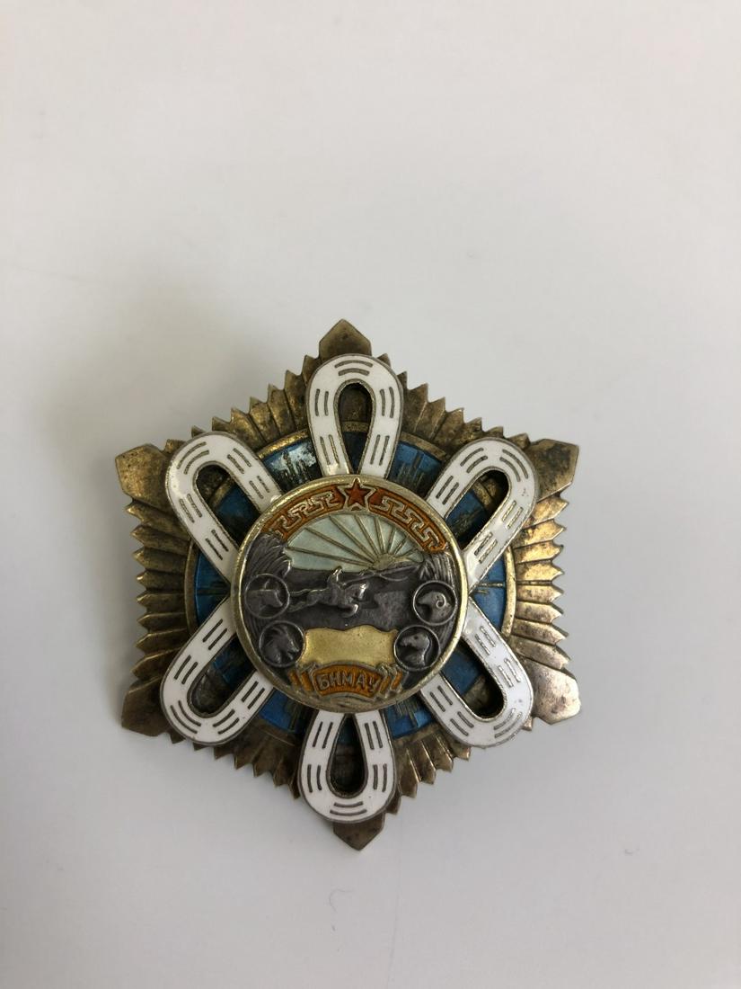 Russia Soviet Silver WWII Screw Back Order: Russia Soviet Silver WWII Screw Back Order. No. 176. Good Condition. Provenance From a New York Estate. Please note the absence of a condition report does not imply that there are no condition issues 