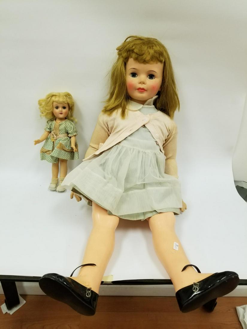 Lot of 2 Ideal Dolls: Lot of 2 Ideal Dolls. 1 is Ideal 35 Play Pal Doll & Other is Toni Ideal Doll 90W. Fair Condition Considering Age. Provenance From a New York Estate. Dimensions- Larger- H-35". Please note the absence