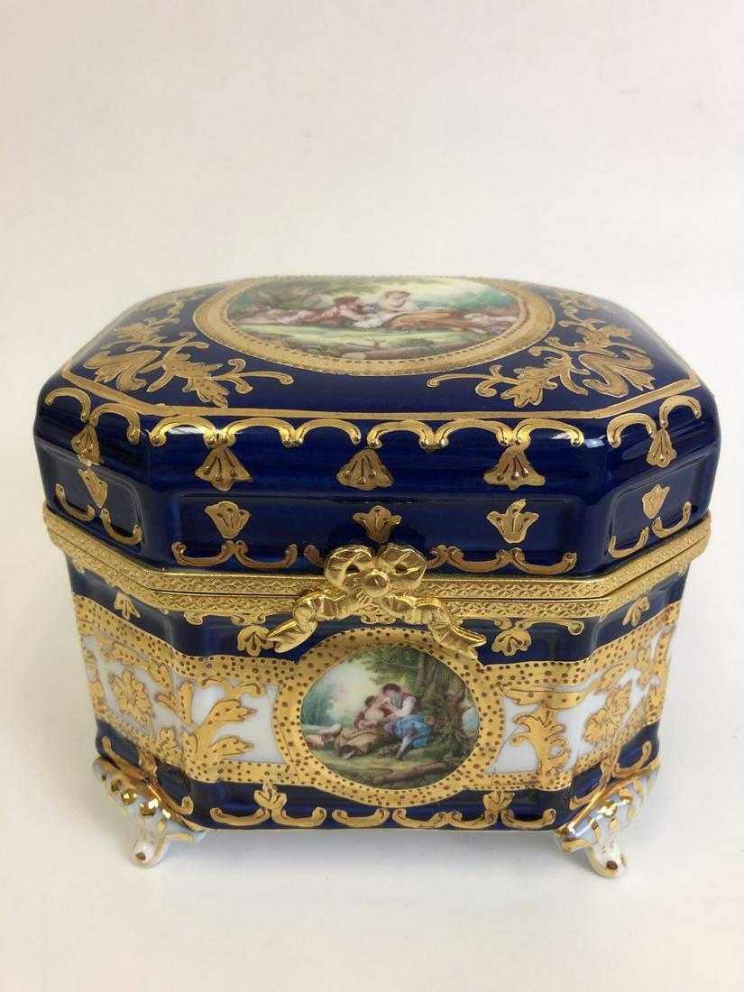 Limonges French Lidded Box: Limonges French Lidded Box Depicting Victorian Woman & Man. Good Condition. Provenance from a Long Island, NY Estate. Dimensions- L-6" x W-5" x H-5.5". Please note the absence of a condition report do