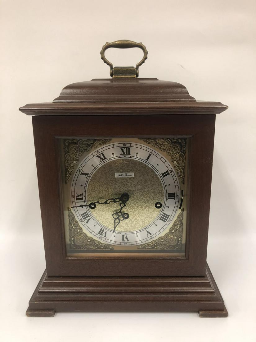 Seth Thomas Mantle Clock: Seth Thomas Mantle Clock. Provenance from a Long Island NY Estate. Generally Good Condition. Dimensions- H-14.5" x L-11" x W-7". Please note the absence of a condition report does not imply that there