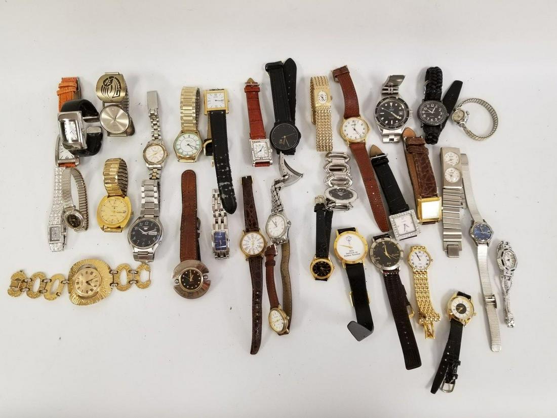 Group Lot of 34 Estate & Vintage Watches: Group Lot of 34 Estate & Vintage Watches Including Lucerne, Citizen, Seiko, Movado, Tissot, Raymond Weil, Cardini, Vernier & DKNY. Provenance from a Queens, NY Home. Please note the absence of a condi