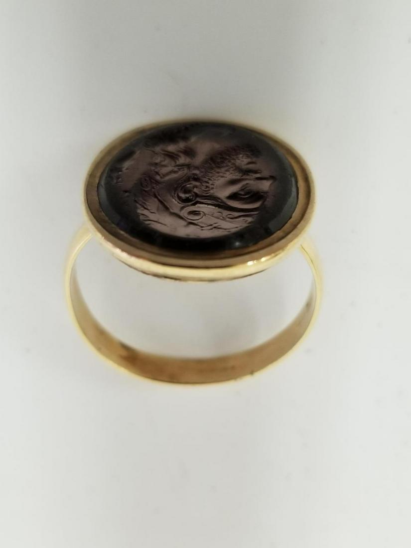 Antique 14k Gold Men's Ring w/ Intaglio Stone: Antique 14k Gold Men's Ring w/ Intaglio Carved Stone. Probably Amethyst. Dimensions- Ring Size- 11. Total Weight- 8.9g/5.7dwt. Please note the absence of a condition report does not imply that there a