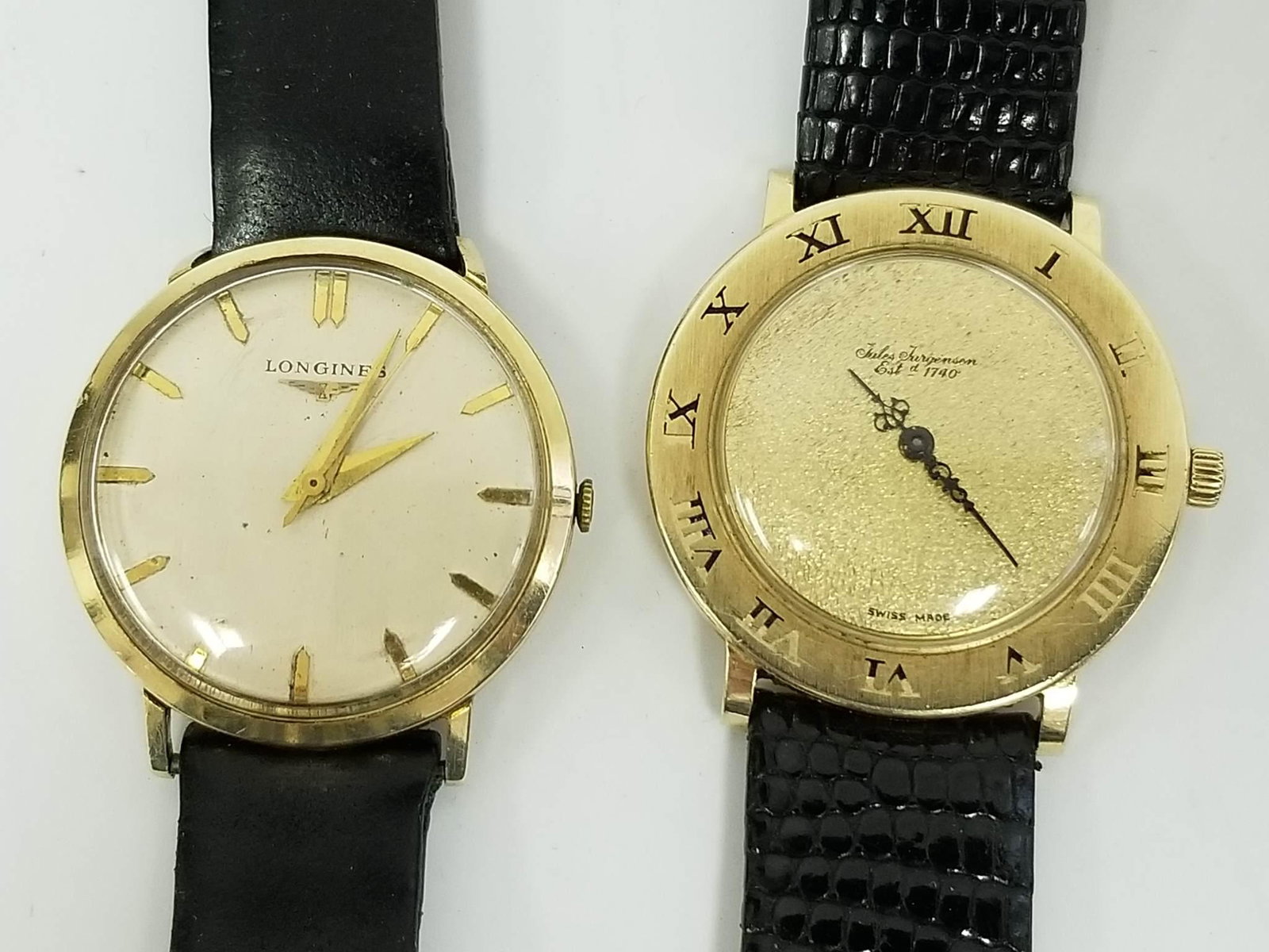 2 14K Gold Mens Wrist Watches Longines: 2 14K Gold Mens Wrist Watches Including 1 14K Gold Longines Watch & 1 14K Gold Jules Jurgensen Watch. Generally Good Condition. Provenance From a Florida Estate. Dimensions- Both- Dia-1.25" approx. Pl