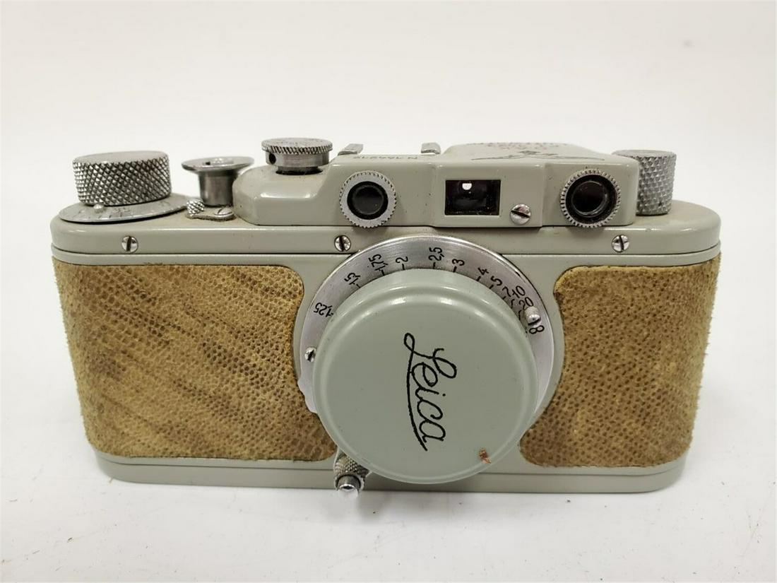Russian copy Of Leica coming from a Zorki: Russian copy Of Leica coming from a Zorki and repainted and engraved WWII Lutfwaffe F.I. 1423 Camera, Green Color. Provenance From an Estate of a Long Island Collector. Please note the absence of a co