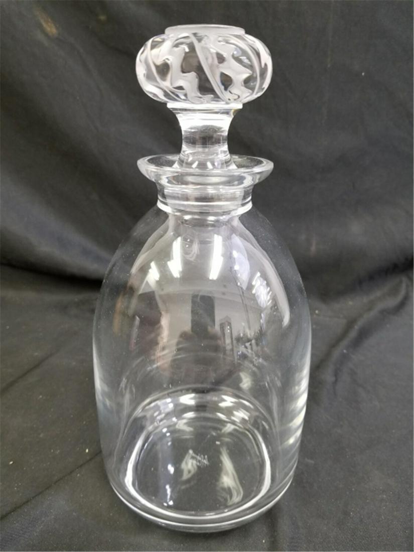 Lalique, France Art Glass Decanter, w/ Stopper.: Lalique, France Art Glass Decanter, w/ Stopper. Provenance Upper East Side New York City Estate. Good Condition. Dimensions- H-9.5". Please note the absence of a condition report does not imply that t