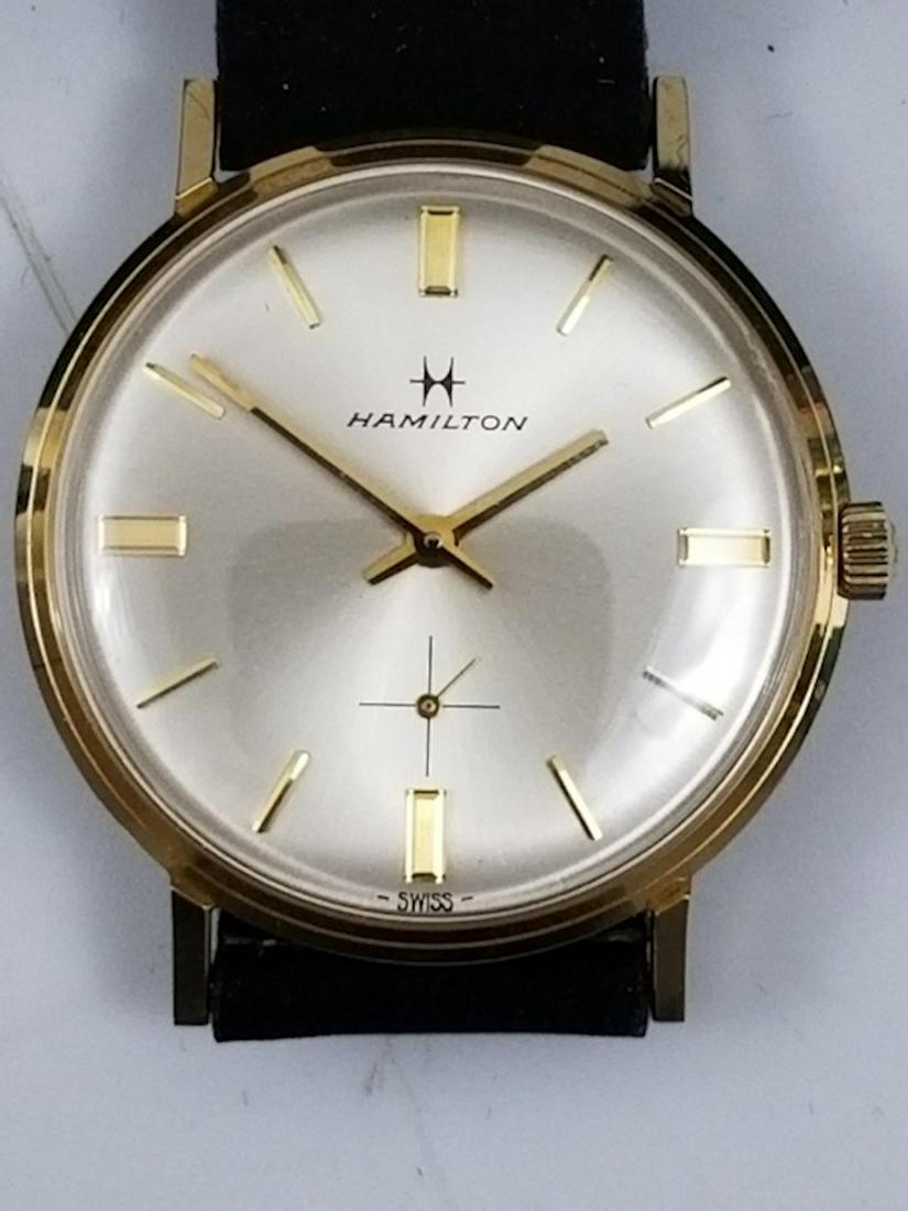 Vintage Men's Hamilton Thinline 14k Gold Wristwatc: Vintage Men's Hamilton Thinline 14k Gold Wristwatch, Model 2036, w/ Original Hamilton Band. Dia. of the face 1.25" Please note the absence of a condition report does not imply that there are no condit