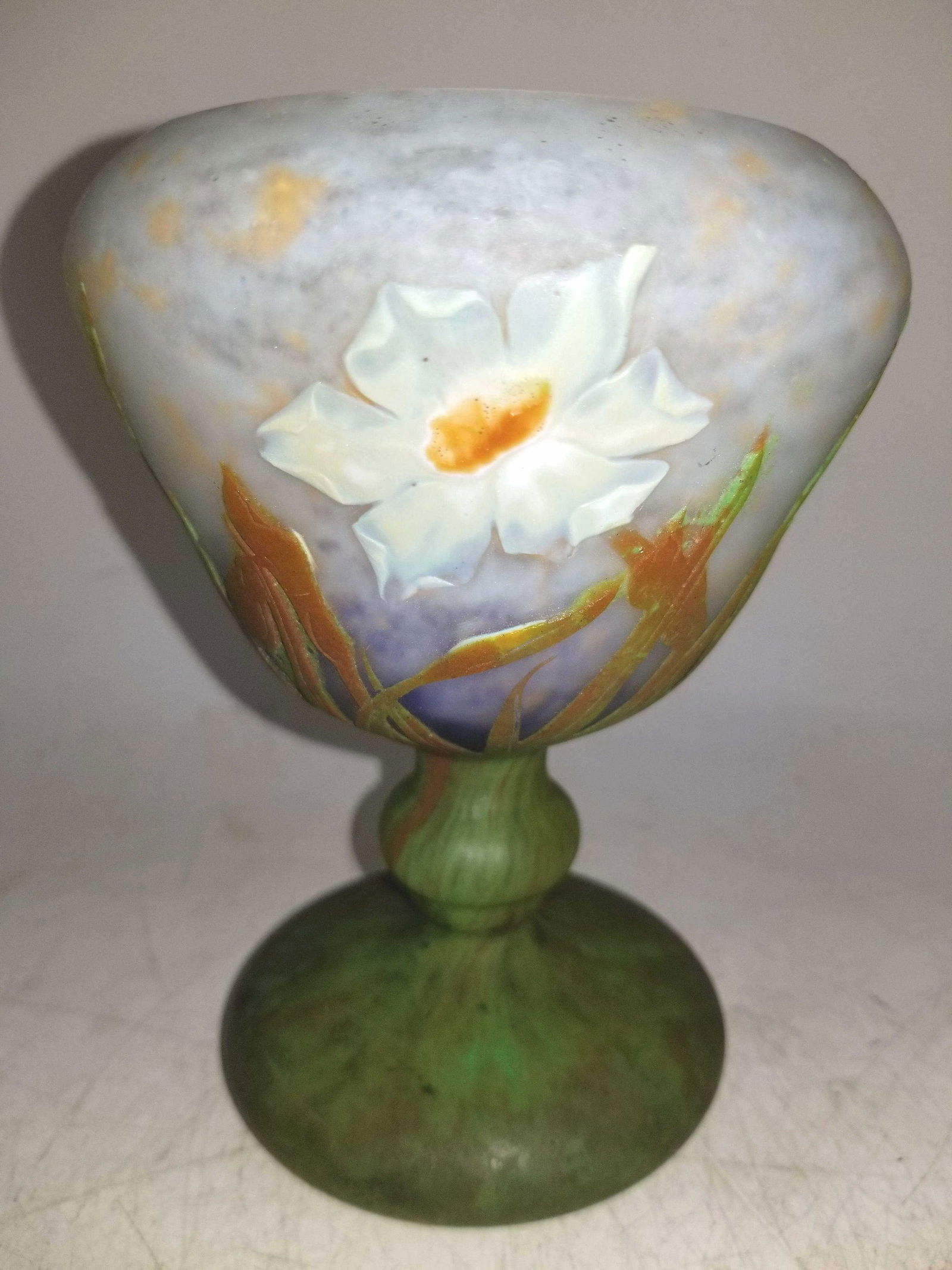 Daum Nancy Cameo Glass Vase w/ Padded Flowers: Daum Nancy Cameo Glass Vase w/ Carved Padded Flowers . Circa 1900. Excellent Condition. Provenance From the 2nd Part of a Mid West Private Collection. Dimensions- H-5.75" x Dia-4.25". Please note the
