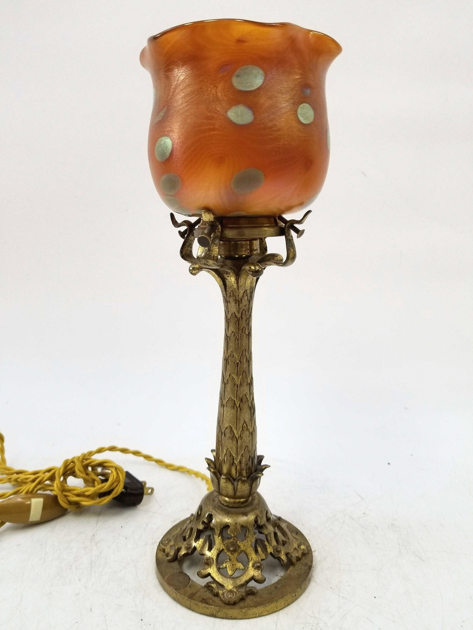 Austrian Art Nouveau Bronze Desk Lamp, Loetz Shade: Austrian Art Nouveau Bronze Desk Lamp with Loetz Shade. Both base and shade are in generally very good condition. Dimensions: Total H 12.5" Provenance: From a Private Westchester collector. Please not