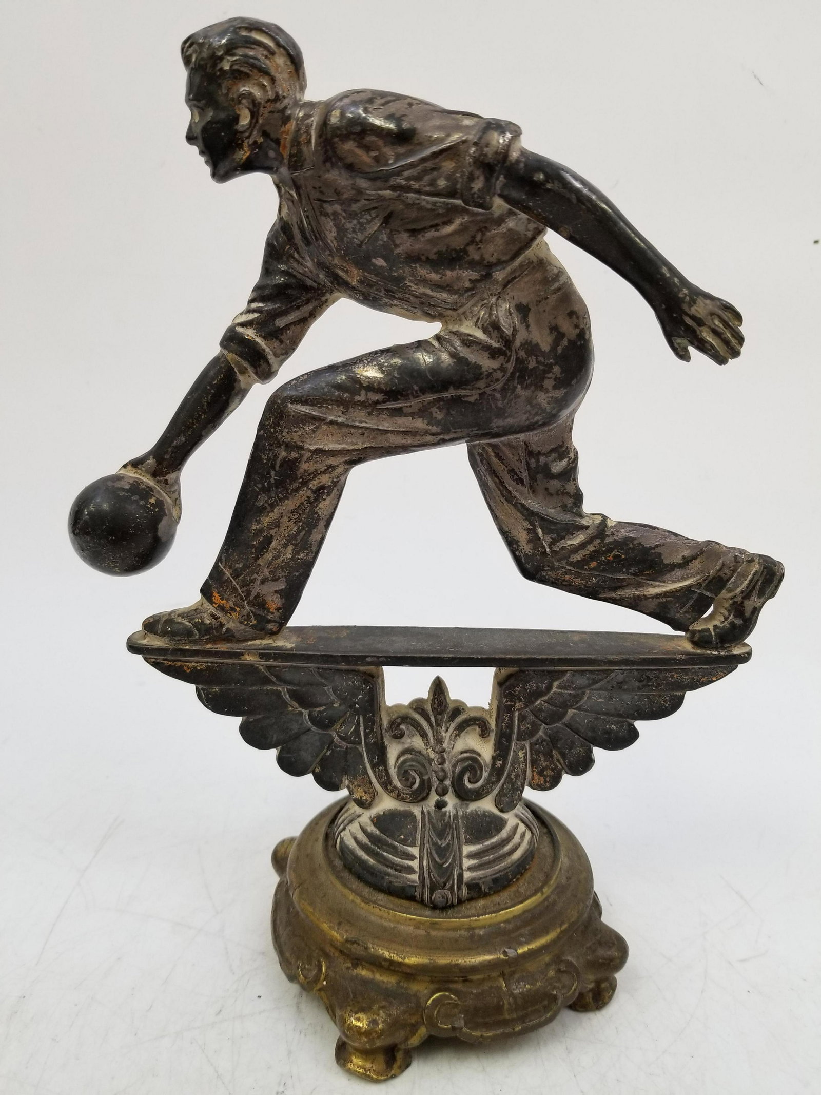 Rare Art Deco Silvered Bronze Bowling Trophy: Rare Art Deco Silvered Bronze Bowling Trophy. Condition: generally good condition, However Tarnished. Dimensions: H 10", W 7.5" Provenance: From a Long Island Estate. Please note the absence of a cond
