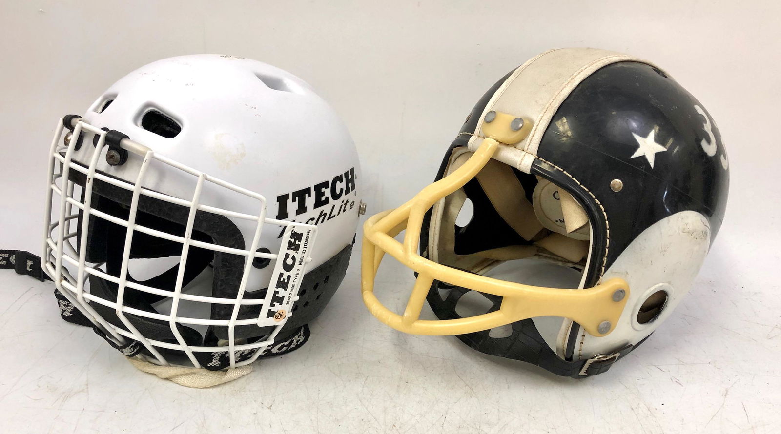 Lot of 2 Vintage Helmets (Football & Hockey) (1 of 1)