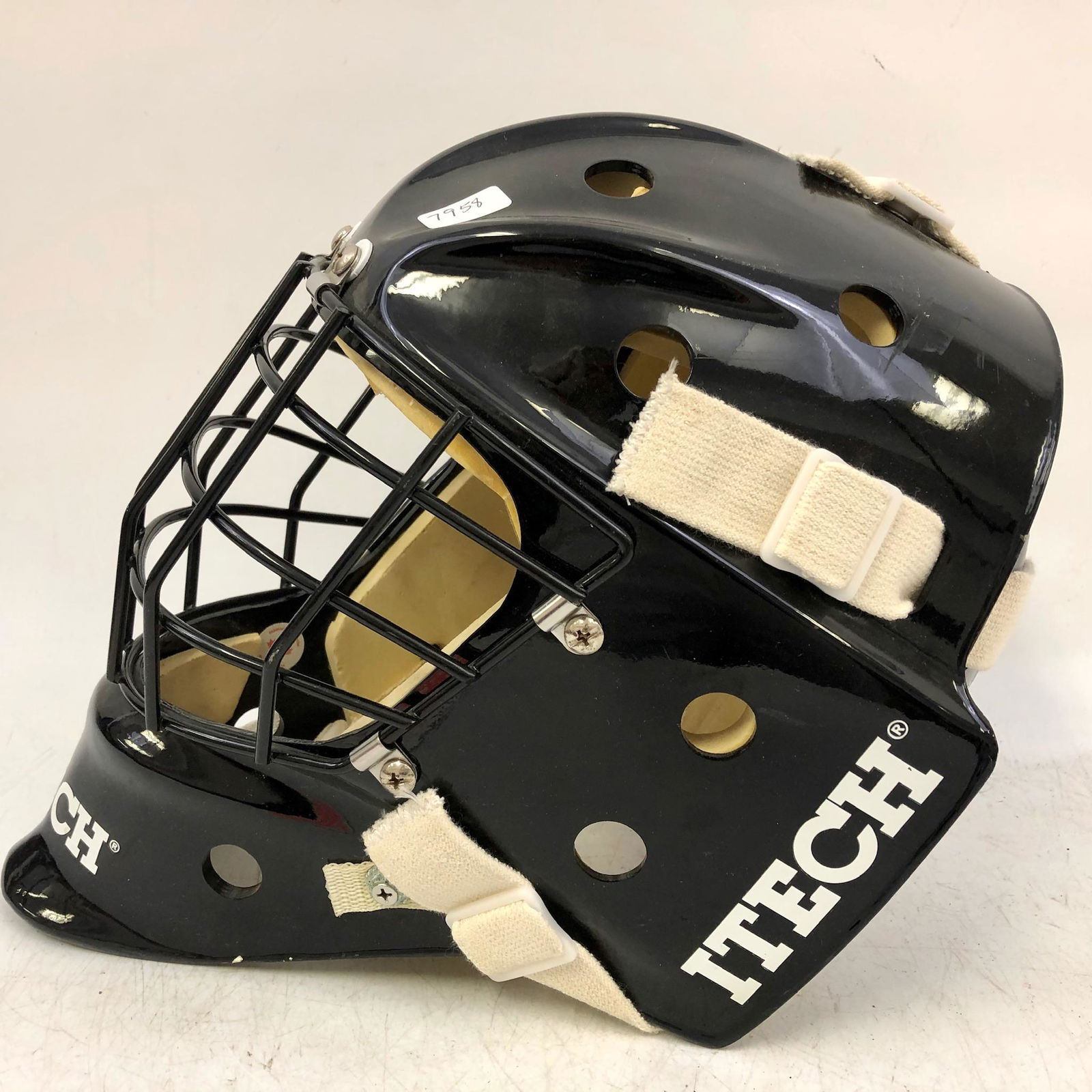 Vintage Ice Hockey Goalie Mask Helmet: Vintage Ice Hockey Goalie Mask Helmet w/ New Harness. Color Black. Itech.Condition- Generally good condition as found.Dimensions- Provenance - from an Upstate NY Estate.Please note the absence of a co