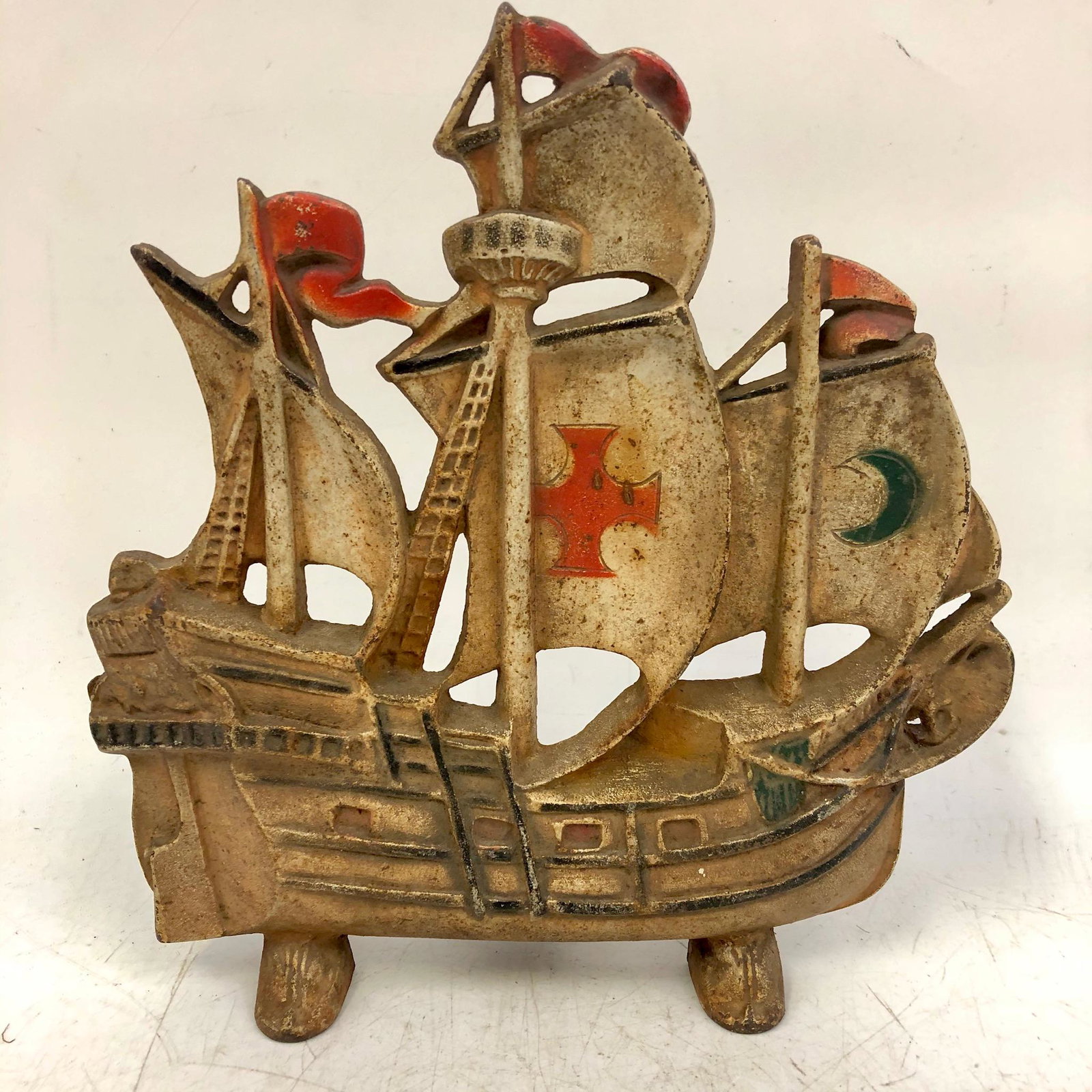 Old Vintage Cast Iron Doorstop/Doorstopper: Old Vintage Cast Iron Doorstop/Doorstopper in the Shape of an Old Ship. Condition- Generally good condition, as found.Dimensions- W x 10" x H- 11".Provenance - from an Upstate NY Estate. Please note t