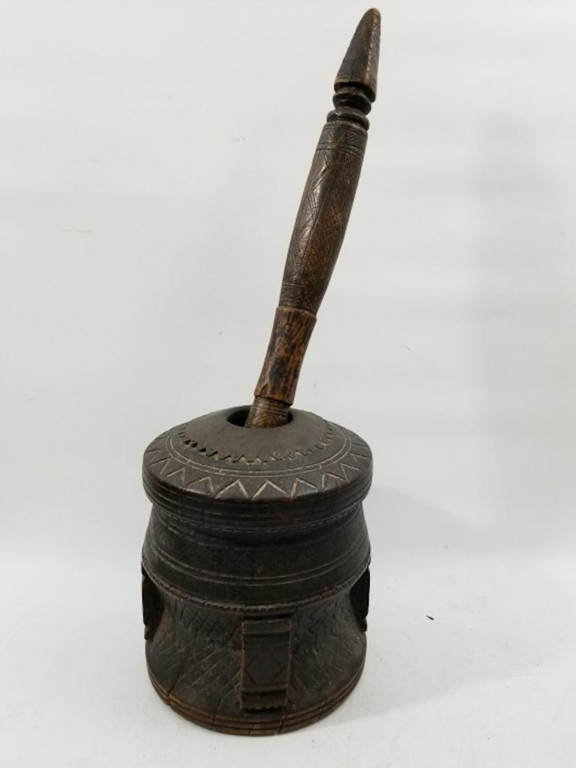 Antique Carved Wood Tribal Mortar & Pestle: Antique Carved Wood Tribal Mortar & Pestle w/ Brass Mounting. Once used for Pharmaceuticals. Condition: Generally Good Condition. Dimensions- Total H-26". Provenance Upper East Side New York City Esta
