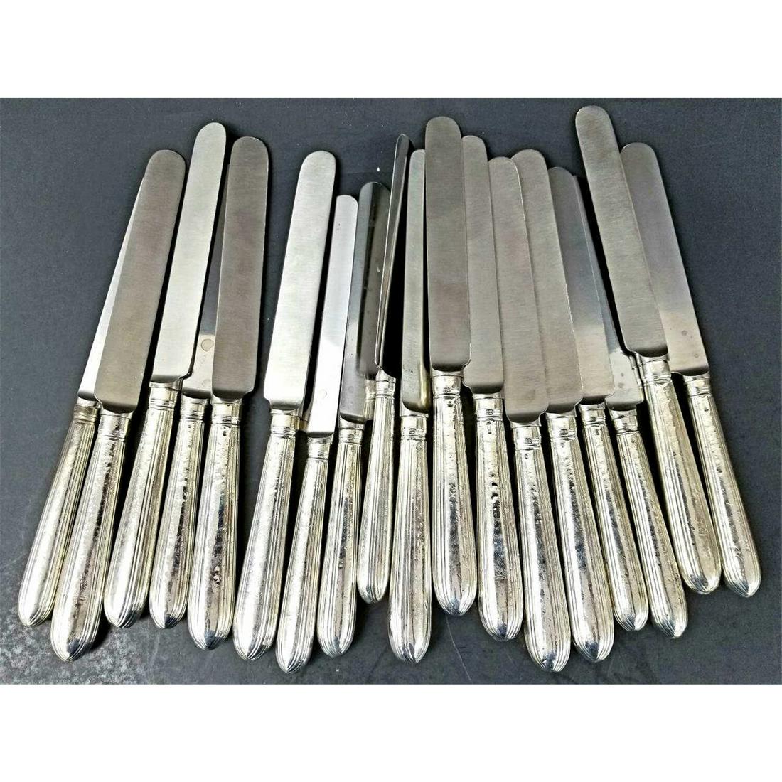 18 English George III Sterling Silver Knives1803: 18 Large English George III Sterling Silver Dinner Knives by John Tweedy, London c.1803. Fully Hallmarked. Condition: Generally Good Condition w/ Minor Dents on Handle due to Age & Use.Dimensions: L-1