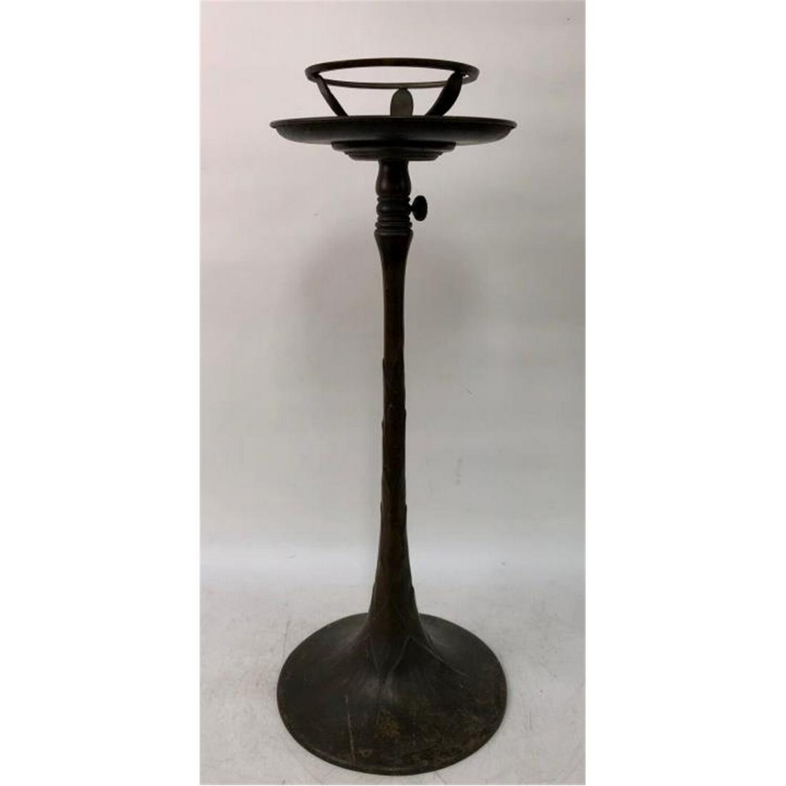 Tiffany Studios NY Bronze Ash Stand Adjustable: Tiffany Studios NY Bronze Ash Stand w/ Adjustable Height. Fully Signed. Condition: Missing the Glass Insert & a Lot of Scratches on the Bronze. Dimensions: H-25" Not Extended, H-36" Fully Extended.Pro