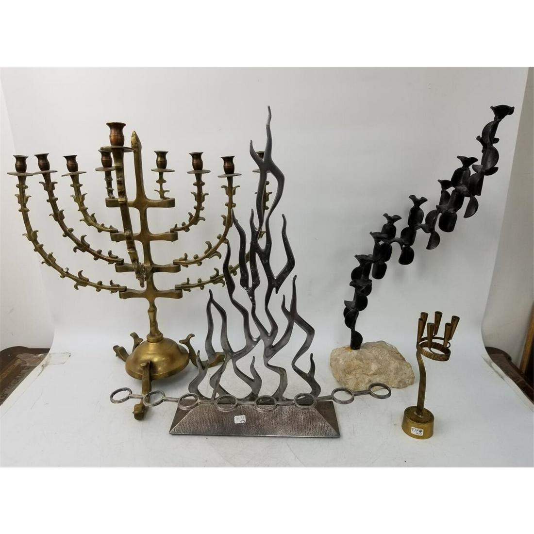 3 Unusual Judaica Mid Century Hanukkah Menorahs: 3 Unusual Judaica Mid Century Large Hanukkah Menorahs Along w/ 1 Old Yad Vashem Remembrance Candle Holder. Condition: Generally Good.Dimensions: Tallest- H-20". Provenance: From a Long Island, NY Home