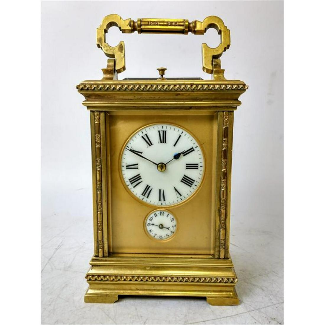 Rare Large "Grand Sonnerie" Bronze Carriage Clock: Rare & Important Large "Grand Sonnerie" Bronze Carriage Clock w/ White Enamel Dial. Condition: Generally Good Condition.Dimensions: Total H Including Handle- 7.5".Provenance: From a Queens, NY Home.Pl