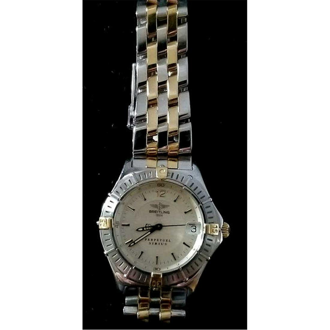 Breitling 18K Gold & Stainless Ladies Quartz Watch: Breitling 18K Gold & Stainless Steel Ladies Quartz Watch. Perpetual Sirius. Fully Signed in Various Places.Condition: Excellent. Dimensions: Face Dia- 1.25".Provenance: From a Long Island, NY Mansion.