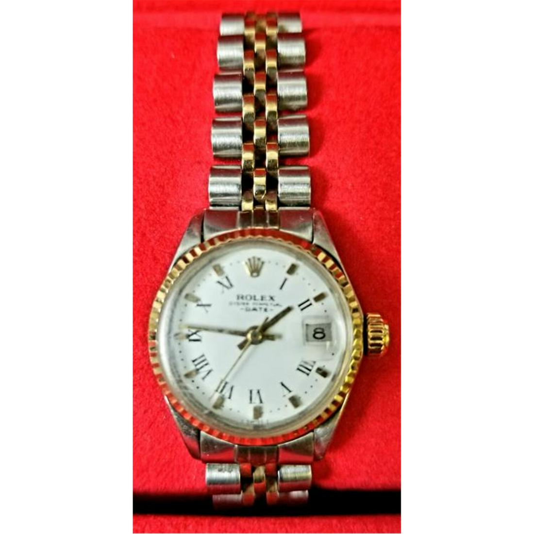 Vintage Rolex Ladies Gold & Stainless Steel Watch: Vintage Rolex Ladies Gold & Stainless Steel Watch w/ Original Box.Condition: Appears to be in Good Condition. Some Scratches on the Glass.Dimensions: Dia of Face-1.1" Including Crown.Provenance: From