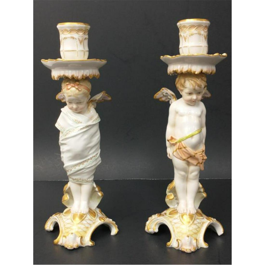 Pair of KPM Porcelain Art Nouveau Candlesticks.: KPM Pair of Porcelain Art Nouveau Figural Candlesticks. Condition: Appears to Have Minor Restorations. Dimensions: H-8.5" Each. Provenance: From a Queens, New York Home. Please note the absence of a c
