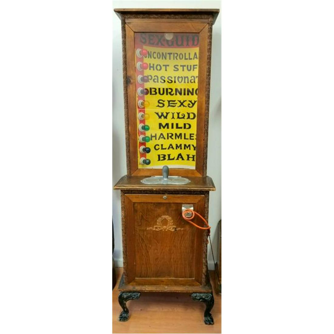 Antique "Sex Guide" Arcade Game Machine.: Antique "Sex Guide" Arcade Game Machine. Condition: Generally Very Good Condition. Dimensions: H-77" x W-24". Provenance: From a Long Island, NY Estate. Please note the absence of a condition report d