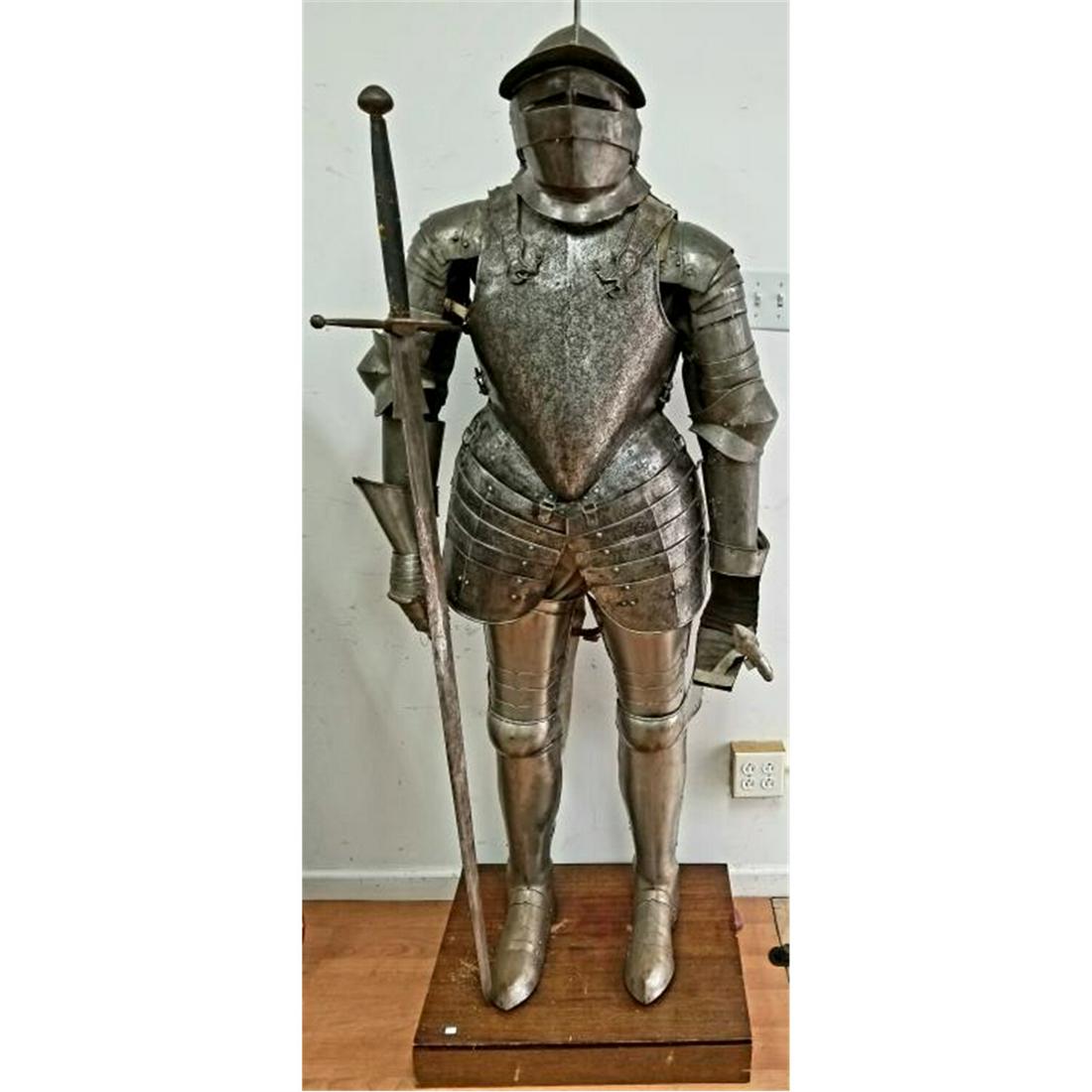 Life Size Knights Suit of Armor, Heavy Metal.: Life Size Knights Suit of Armor Made of Heavy Metal including chest guard, back guard, waist guard & the rest. Vintage to Old Including Long Sword. Exceptional Quality w/ Removable Eye Guard on a Shor