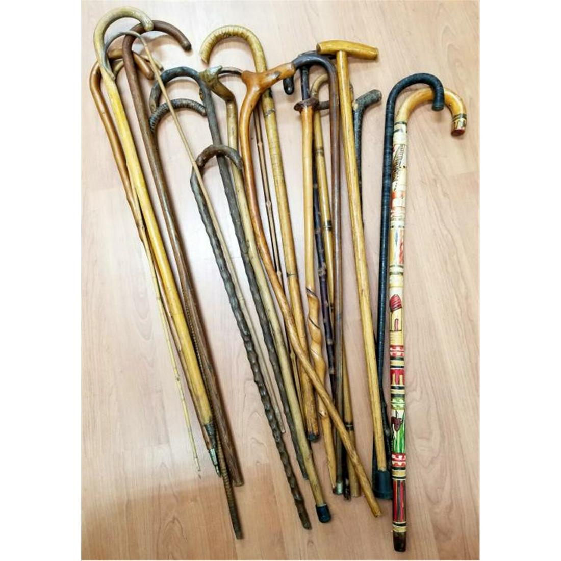 Lot of 20 Various Vintage Canes & Walking Sticks.: Lot of 20 Various Vintage Canes & Walking Sticks. 18 Are Wood & 2 Are Bamboo. Condition: Generally Good. As Found. Dimensions: Longest- L-39". Provenance: From a Long Island, NY Collector. Please note
