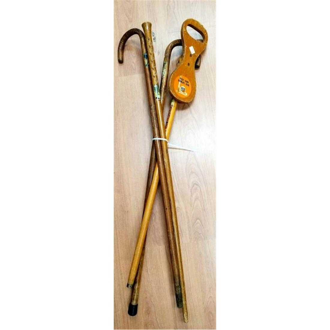 4 Vintage Wood Canes From 1939, NY World Fair.: Lot of 4 Vintage Wood Canes From 1939, NY World Fair. 1 Can Be Used As A Seat. Condition: Generally Good. As Found. Dimensions: Longest- L-35". Provenance: From a Long Island, NY Collector. Please not