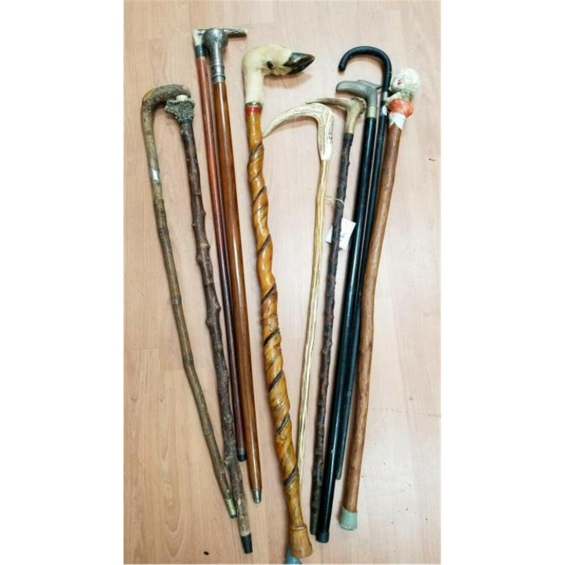 Lot of 10 Old Canes & Walking Sticks.: Lot of 10 Old Canes & Walking Sticks. 4 with Deer Antler Handles & 1 with Cows Foot Handle. Condition: Generally Good. As Found. Dimensions: Longest- L-39". Provenance: From a Long Island, NY Collecto
