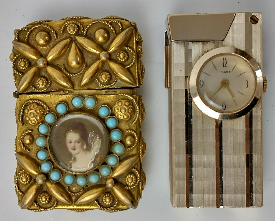 2 Vintage Lighters Including Swank: 2 Vintage Lighters. 1 w/ Swank Watch Inside. Condition: Generally Good As Found. Dimensions: H-2.3". Provenance: From a Long Island, NY Estate.Please note the absence of a condition report does not im