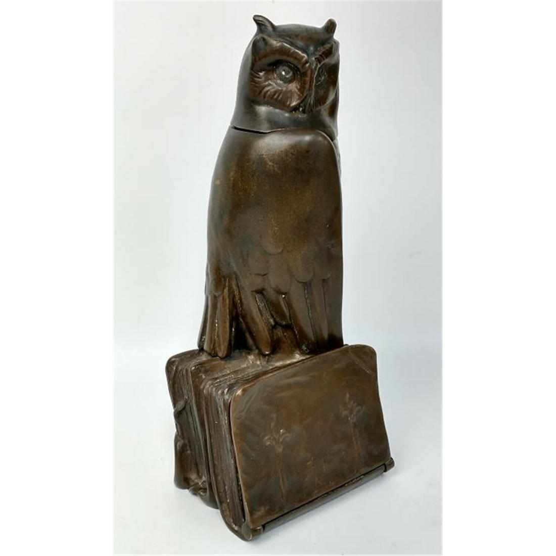 Art Nouveau Bronze Inkwell & Clock Holder.: Art Nouveau Bronze Inkwell & Clock Holder Figure of an Owl, Signed on the Back, Makonvichia. Missing Glass Inkwell and the Clock. Condition: Generally Very Good Condition. Dimensions: H-9.25". Provena
