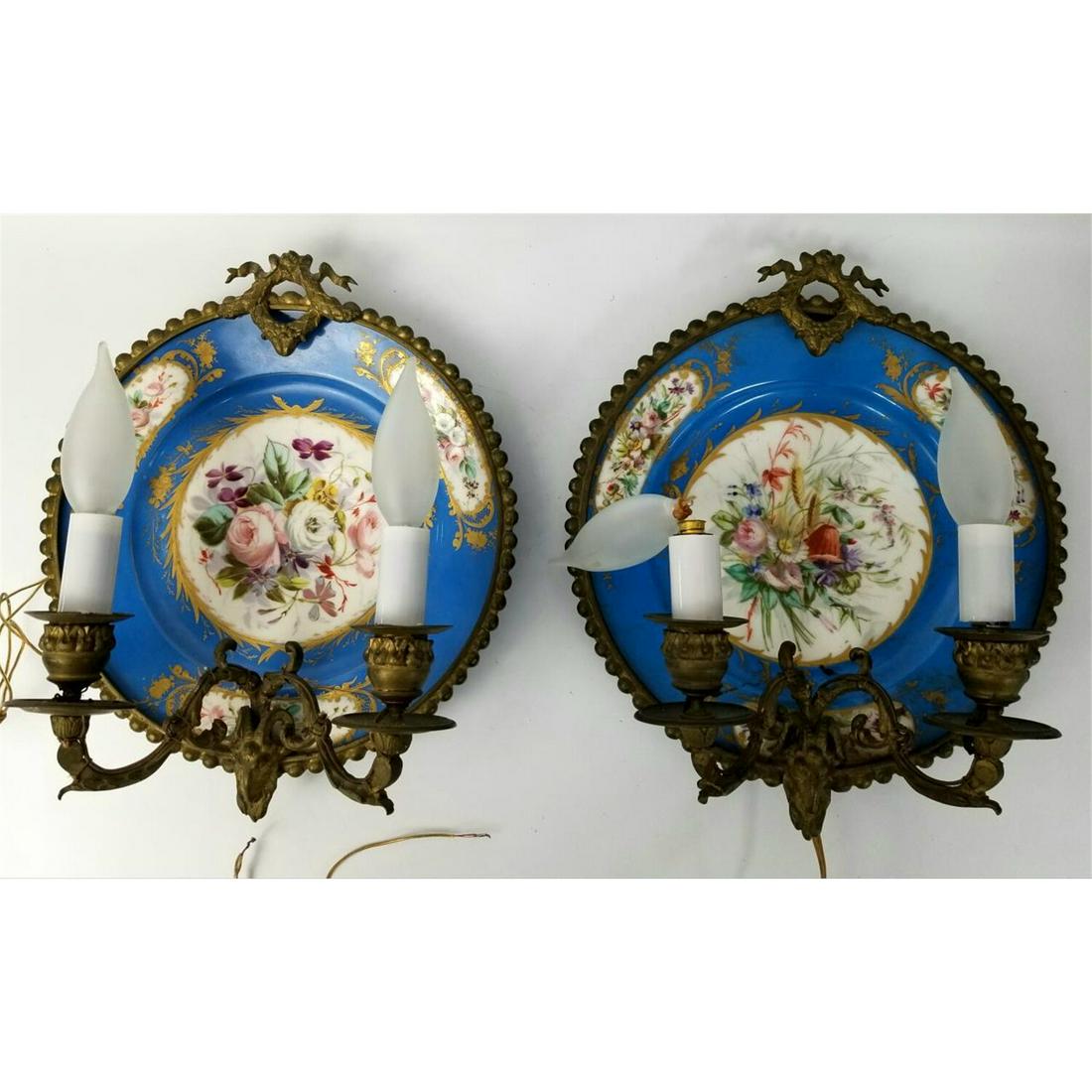 Antique Pair of Sevres Porcelain Plates/Sconces.: Antique Pair of Sevres Porcelain Plates Made into Wall Sconces with Bronze Mounts. Condition: 1 Plate Has Been Repaired. Dimensions: Plate-Dia-9". Total H-11.5" w/ Bronze. Provenance: From a Long Isla