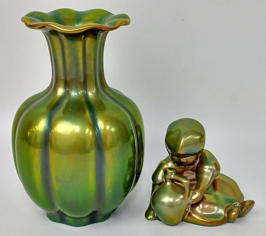 2 Hungarian Zsolnay Green Iridescent Eosin Items.: 2 Hungarian Zsolnay Green Iridescent Eosin Items, Including 1 Vase & 1 Figure of a Child with Vase. Condition: Both in Excellent Condition. Dimensions: Vase-H-6". Provenance: From a Long Island, NY Ho