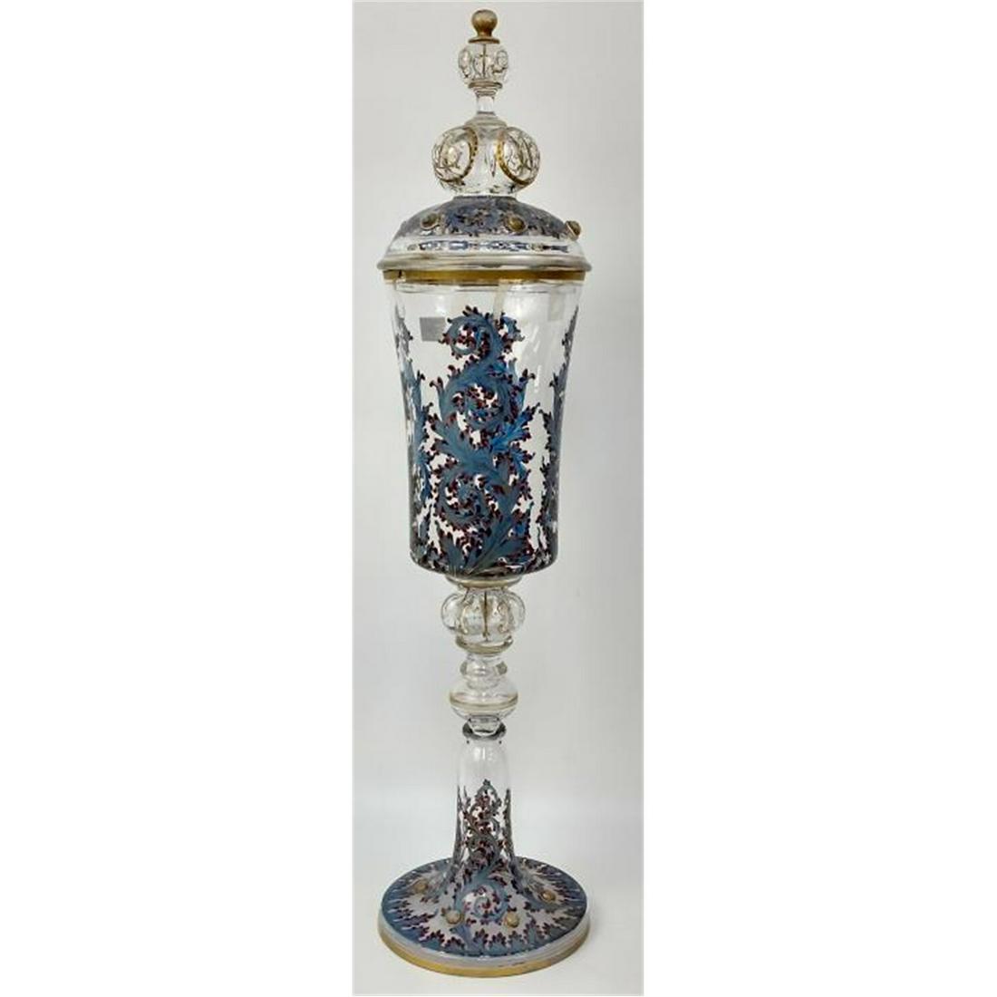 Antique European Enameled Glass Covered Pokal.: Antique European Enameled Glass Covered Pokal. Condition: Chip & Bruise on the Top Edge. Dimensions: H-22" Including Lid. Provenance: From a Long Island, NY Home. Please note the absence of a conditio