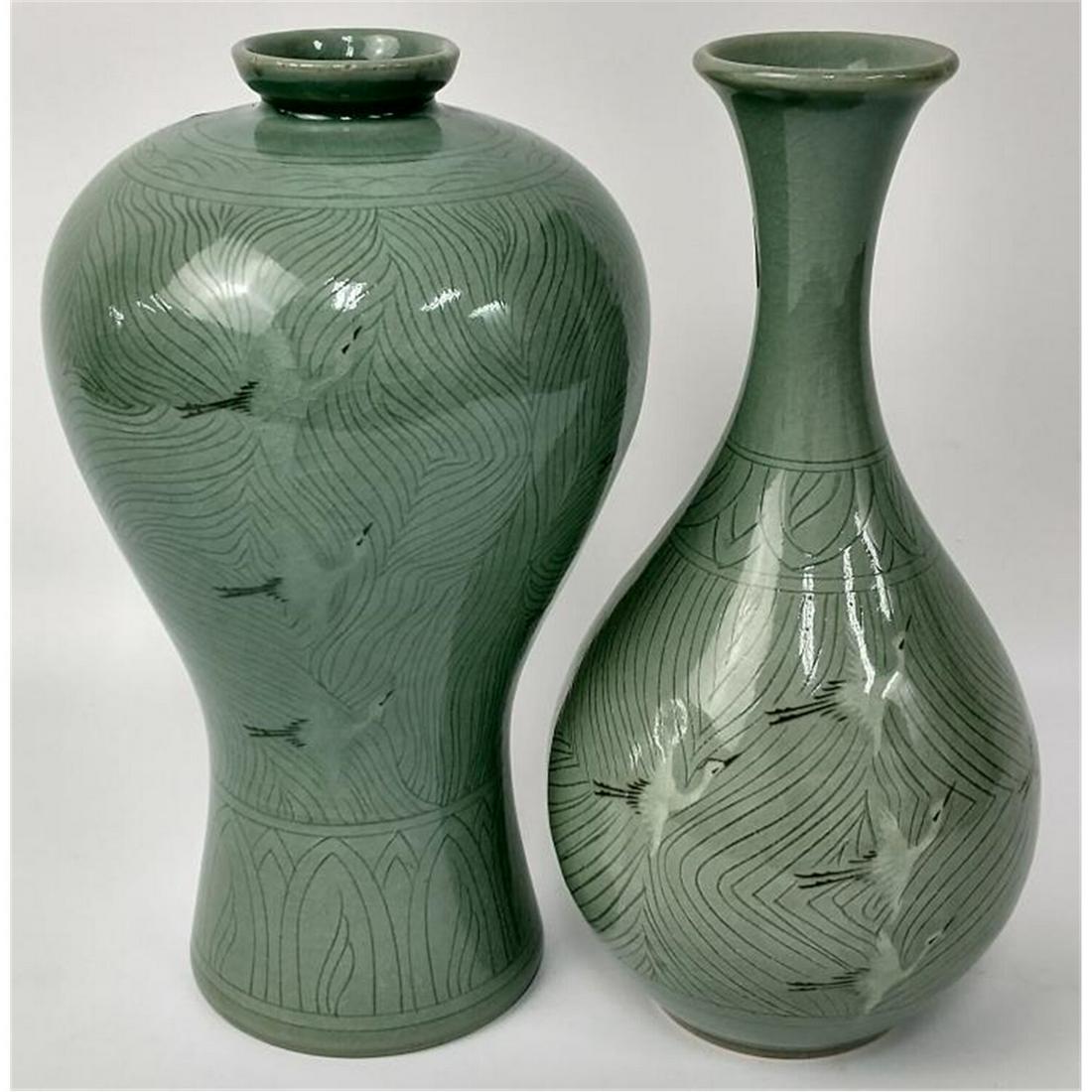 2 Antique Japanese/Korean Celadon Porcelain Vases.: 2 Antique Japanese or Korean Celadon Porcelain Vases with Decorations of Flying Cranes. Both Signed at the Bottom. Condition: Very Good Condition. Dimensions: H-9" Each. Provenance: From a Long Island