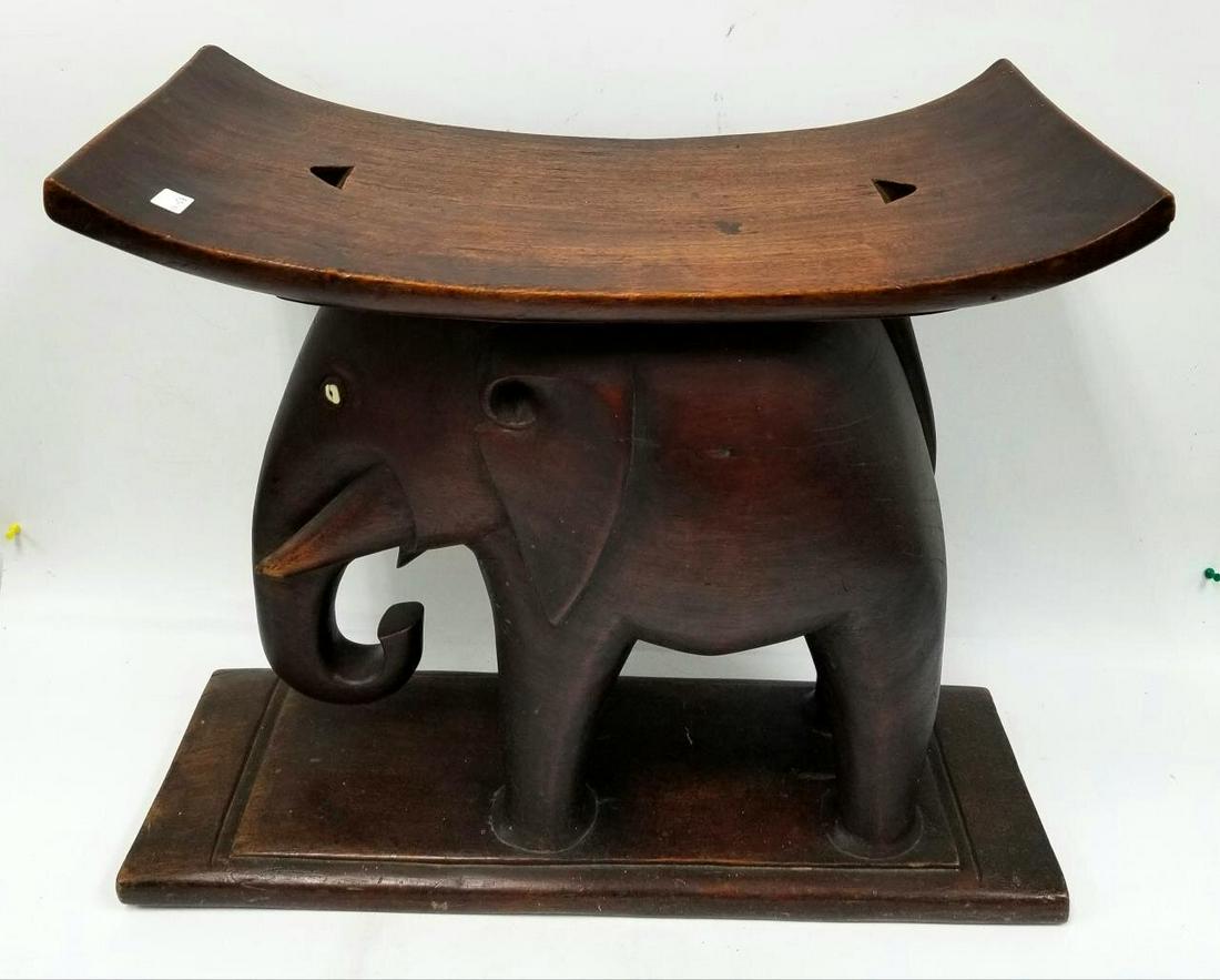 Antique Asian or African Solid Carved Wood Stool.: Unusual Antique Asian or African Solid Carved Wood Stool with Elephant Motif. Condition: Generally Good Condition. With minor loses due to age. Dimensions: H-19.5" x L-21.5" x W-10.5". Provenance: Fro