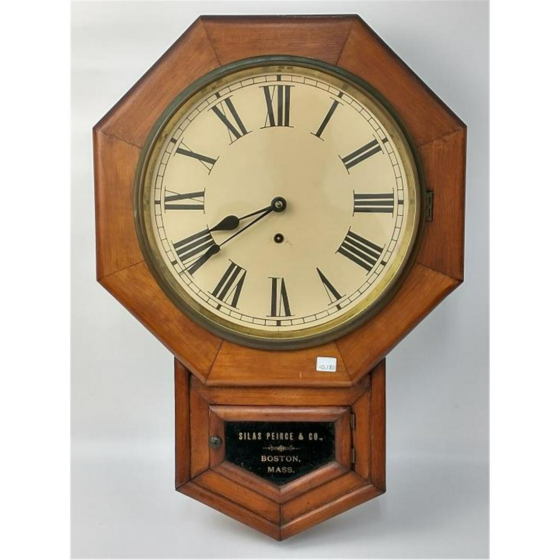 Antique Wall Clock for Silas Peirce & Co.: Antique Wall Clock for Silas Peirce & Co., Boston, Mass. Condition: Appears to be in Generally Good Condition. Dimensions: H-24" x W-18". Provenance: From a Long Island, NY Home. Please note the absen